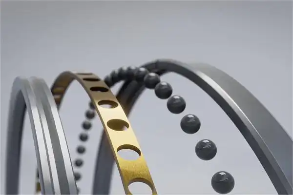 Nola kudeatzen da lubrifikazioa zehaztasun handiko kontaktu angeluarreko errodamendu batean?